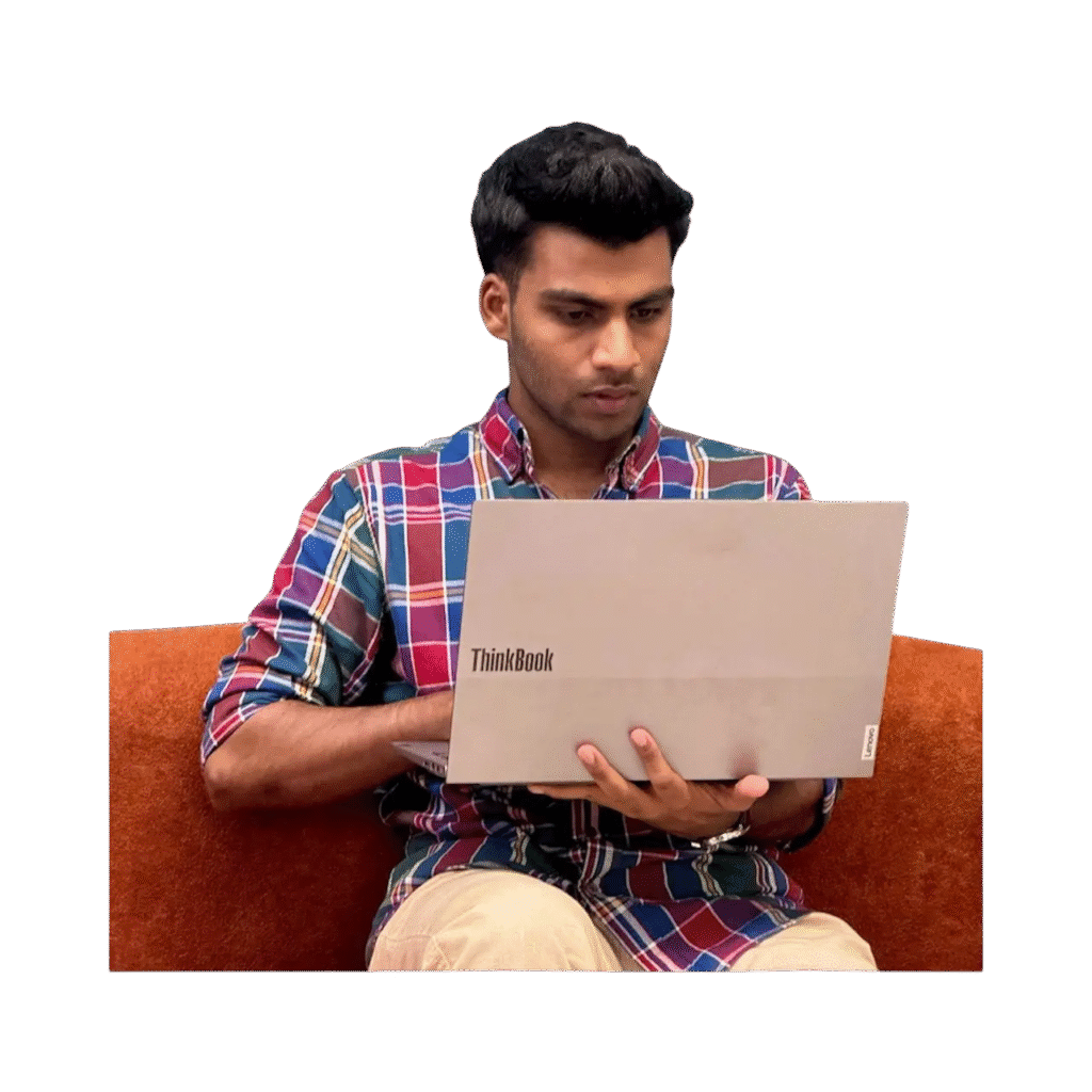 image of sahal looking at the laptop of the best content writer in Dubai